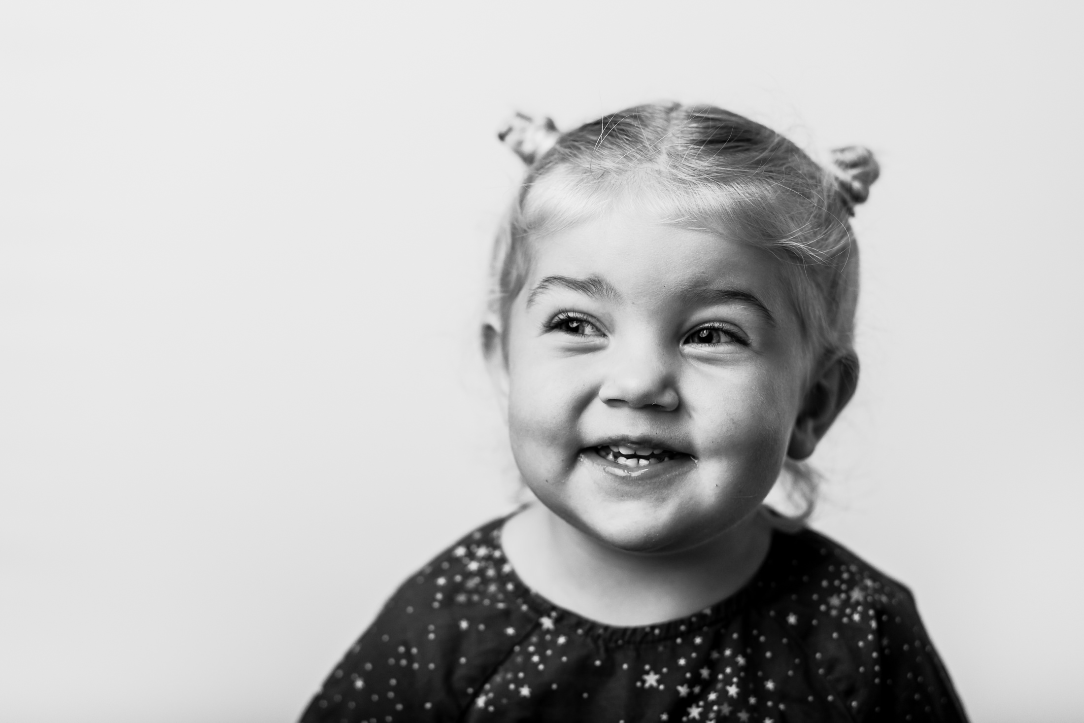School portrait of a smiling toddler and preschool student