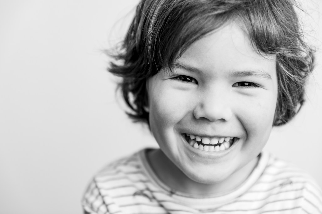 Each child's fine art school portrait session will last 2-5 minutes.  We chat and joke, all while capturing natural smiles and expressions.  Some kids are more expressive than others!  